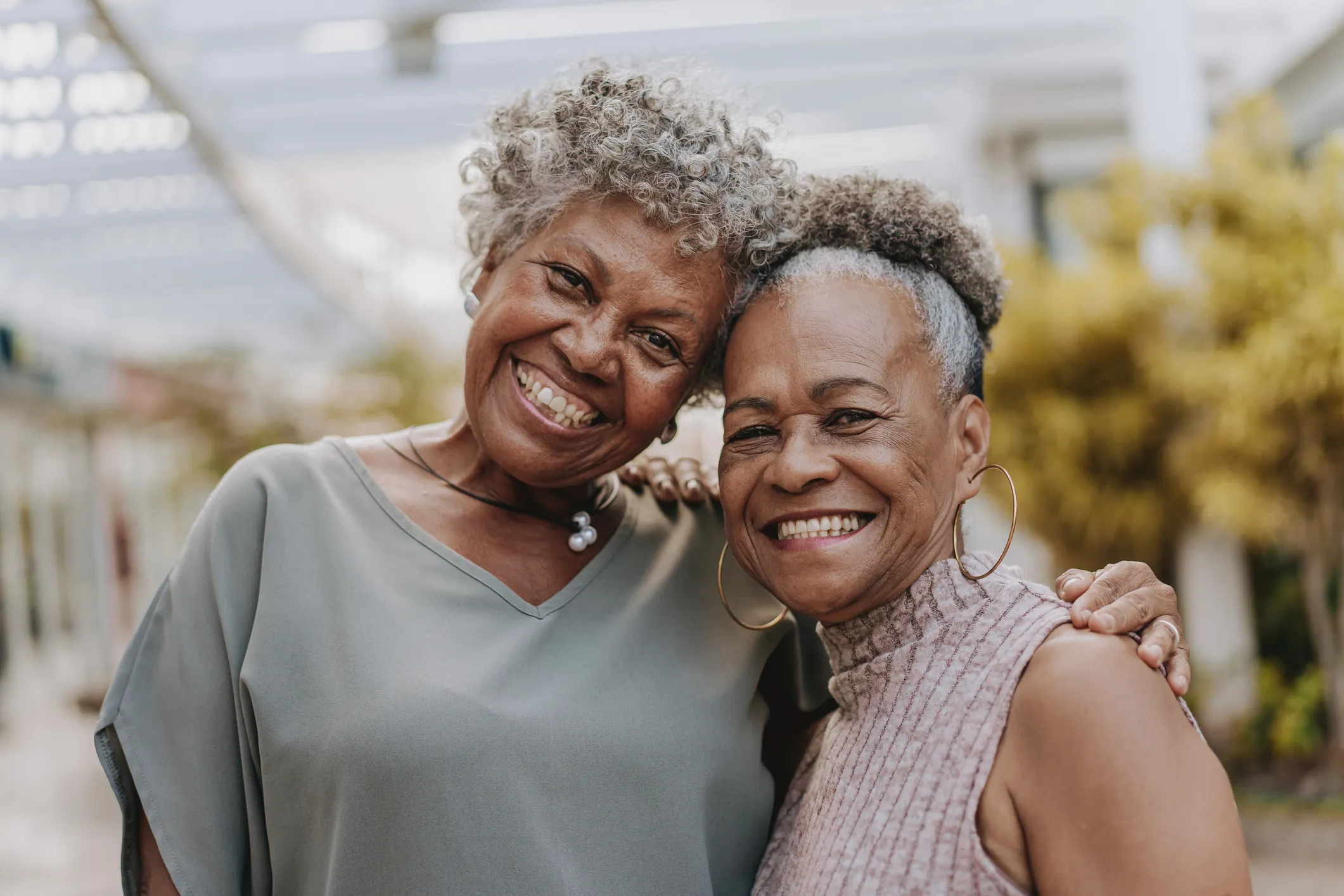 smiling senior residents at the Ivy of McKinney Assisted Living
